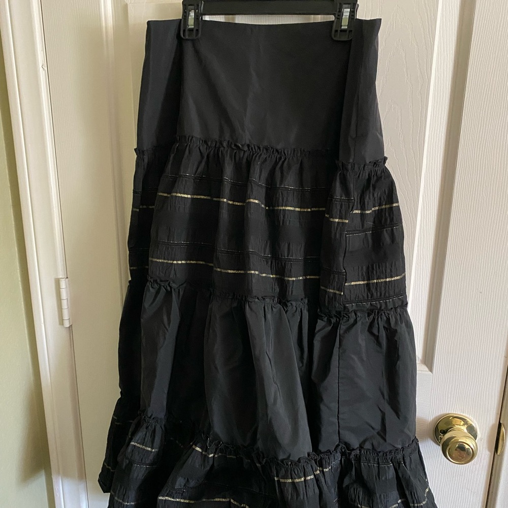 $Black circle skirt with gold trim